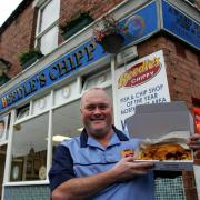Peter Beedle outside his fish and chip shop in Bishop Auckland in 2005