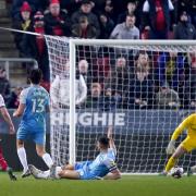 Shane Ferguson fires home Rotherham's second goal against Sunderland