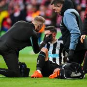 Fabian Schar receives treatment for a facial injury during last weekend's Carabao Cup final defeat to Manchester United
