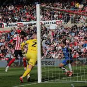Trai Hume heads home his first Sunderland goal against Birmingham City