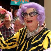 Barry Humphries, as his character Dame Edna Everage,  who has died aged 89