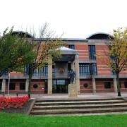Medical expert rules out accidental cause of child's injuries, Teesside Crown Court hears