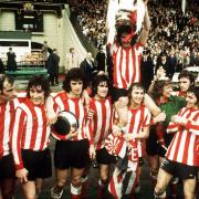 Sunderland's players celebrate with the FA Cup in the wake of their Wembley triumph over Leeds United