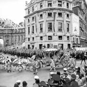 Queen Elizabeth II in the Gold State Coach returning to Buckingham Palace, London, after the Coronation