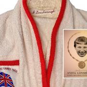 The official Team GB towelling robe, with the incorrect spelling, and. inset, one of the programmes in the sale