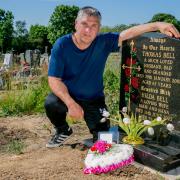 Tom Bell at the grave of his mam Hilda and dad Thomas after discovering last year that his father had been buried in the wrong place for 17 years. A gravestone has finally been erected in memorial to the couple who are now buried together,