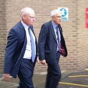 Mike Veale, left, leaving the hearing in Middlesbrough