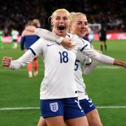 England's Chloe Kelly and Alex Greenwood celebrate victory following a penalty shoot-out victory over Nigeria