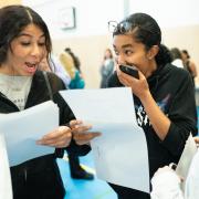 Pupils open their GCSE results at Paddington Academy in London.