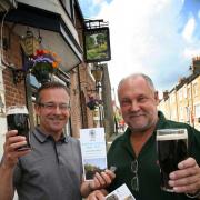 TOUGH TASK: Camra beer trail guide organisers Bob Chapman, left, and Nick Young at the launch of the guide at the Elm Tree, Durham City.