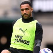 Callum Wilson wears a top emblazoned with one of Newcastle's sponsors Fun88