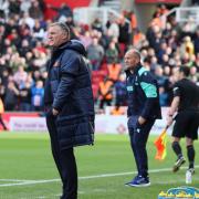 Tony Mowbray and Alex Neil watch on from the touchline at Stoke's bet365 Stadium