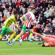 Dan Neil clips home Sunderland's second goal in their 3-1 win over Norwich City