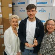 Director of Operations Carolyn Flanigan, Alfie Owen and Chief Operating Officer Dr Catherine Bladen in Absolute Antibody's warehouse
