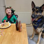 JJ Dodd-Moore with Buddy the dog. The pair are excited for their first proper Christmas together.