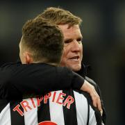 Eddie Howe embraces Kieran Trippier in the wake of Newcastle's defeat at Everton