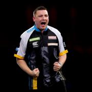 Chris Dobey takes on defending champion Michael Smith in the last 16 at the World Darts Championships