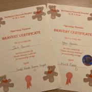The bravery certificates presented to Jack and Iggy