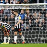 Dan Burn (right) had a difficult afternoon in Newcastle's 4-4 draw with Luton