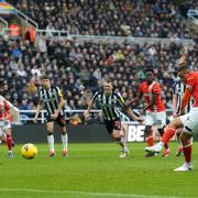 Carlton Morris scores from the spot in Newcastle United's 4-4 draw with Luton Town