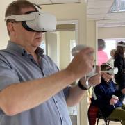 Participants in the trial lose themselves in a world of virtual reality