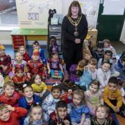 Mayor of Darlington Jan Cossins visited Polam Hall School's  Reception class to share a story on World Book Day
