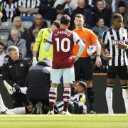 Jamaal Lascelles receives treatment during Newcastle United's win over West Ham