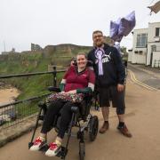 Mark Robson with Gemma Potts at the end of his coast to coast challenge