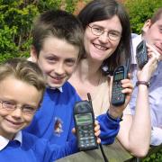 Recycling mobile phones and ink jet cartridges at Pittington School. Pupils Adam and Ben Walker handed over to Michelle Woods from St Cuthbert’s Hospice and Mark James representing Wildlife Trust
