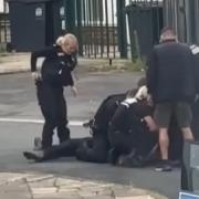 Police restrain and arrest a suspect in the Headlam Road area of Darlington