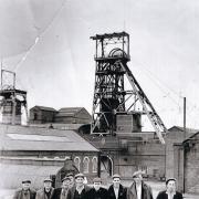 UNDERGROUND ARMY: A group of men leave a shift at Dean and Chapter Colliery on July 7, 1963 – three years before it shut. Does anyone recognise anyone?