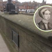 The plaque at the end of Ouse Bridge in York commemorates the life of Margaret Clitherow, who suffered a brutal death