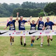 The winning family group, Less Haste Moore Speed combination, cross the finish line on Durham Racecourse in Paul's Families on Track event