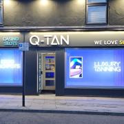 Queenie's Casino Slots and Q-TAN on South Street