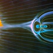 Sketch of the interaction between the solar wind and a magnetized planet