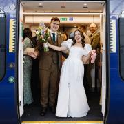 Newlyweds Clare Robinson-Wall, 30, and her husband, Harry, 29, originally from Teesside, celebrated their marriage by travelling on a Northern train from Leeds station to New Pudsey with 80 guests