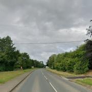 A person has been rescued from an ablaze car after a crash.