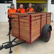 New College Durham Level 2 site carpentry students with restored trailer for Beamish Museum