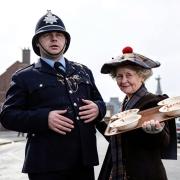 Terry Joyce with actress Gudrun Ure on the Super Gran TV series.