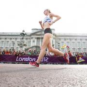 Chris Booth's shot of the day: Johanna Jackson from New Marske passing Buckingham Palace. Unfortunately she was disqualified from the event , which was won by Russia's Elena Lashmanova