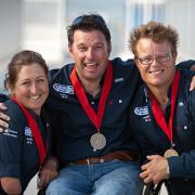 READY FOR THE GAMES: John Robertson, centre, with crew members Hannah Stodel and Steve Thomas