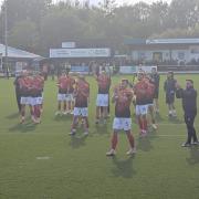 Darlington's players celebrate after their Bank Holiday win over Radcliffe