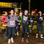 All smiles at the start of the 2025 HogmanHOWAY 5K