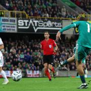 Northern Ireland’s Isaac Price attempts a shot on goal against Hungary (PA)