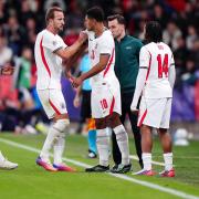 Harry Kane hands the captain’s armband to substitute Jude Bellingham during England’s win in Prague (Bradley Collyer/PA)