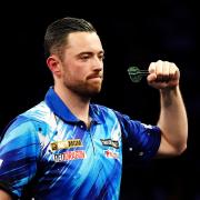 Luke Humphries defeated Dave Chisnall to reach the second round of the World Grand Prix in Leicester (Bradley Collyer/PA)