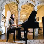 COMPLETE CONTRAST: Lucy Adams, solicitor and pianist, plays at Rockliffe Hall, in Hurworth, near Darlington