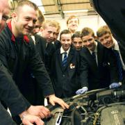 GREAT CAREER: Sherwoods’ technicians Mark Cardwell, left, and Adam Atkinson, with students from Haughton Academy, in Darlington