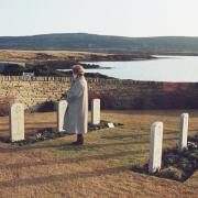 PRIVATE TRIBUTE: Former Prime Minister Margaret Thatcher standing alone at San Carlos cemetery, on the Falkland Islands, on June 15, 1992, to remember the servicemen who lost their lives during the conflict