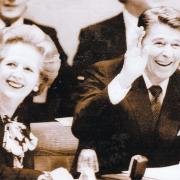 SHOULDER TO SHOULDER: Margaret Thatcher and Ronald Reagan enjoy a laugh before the meeting of the North Atlantic Council at Nato headquarters, in Brussels, in 1985